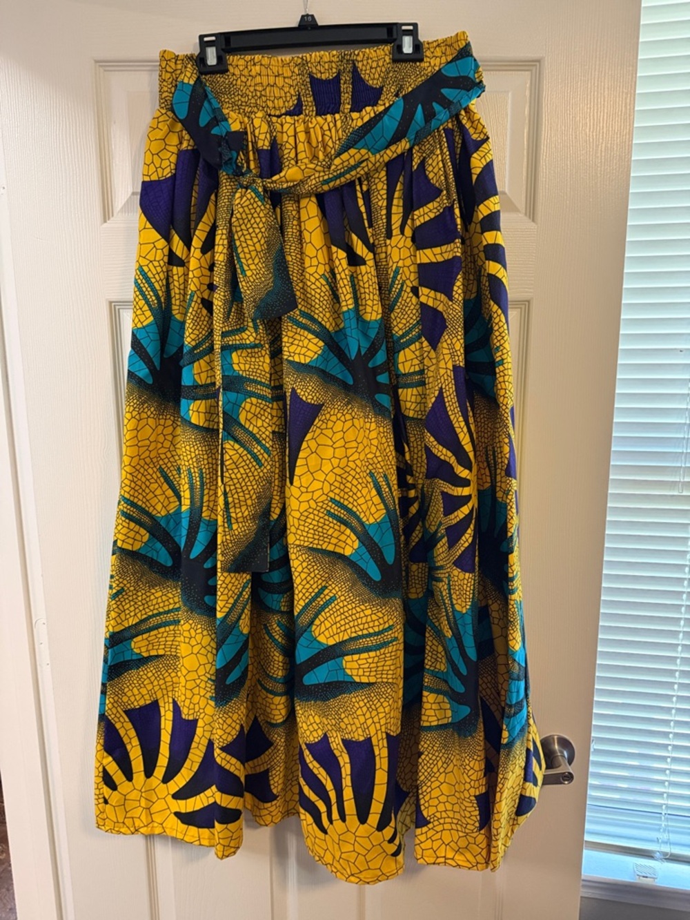 Vibrant Yellow Printed Midi Skirt with Teal & Purple Accents